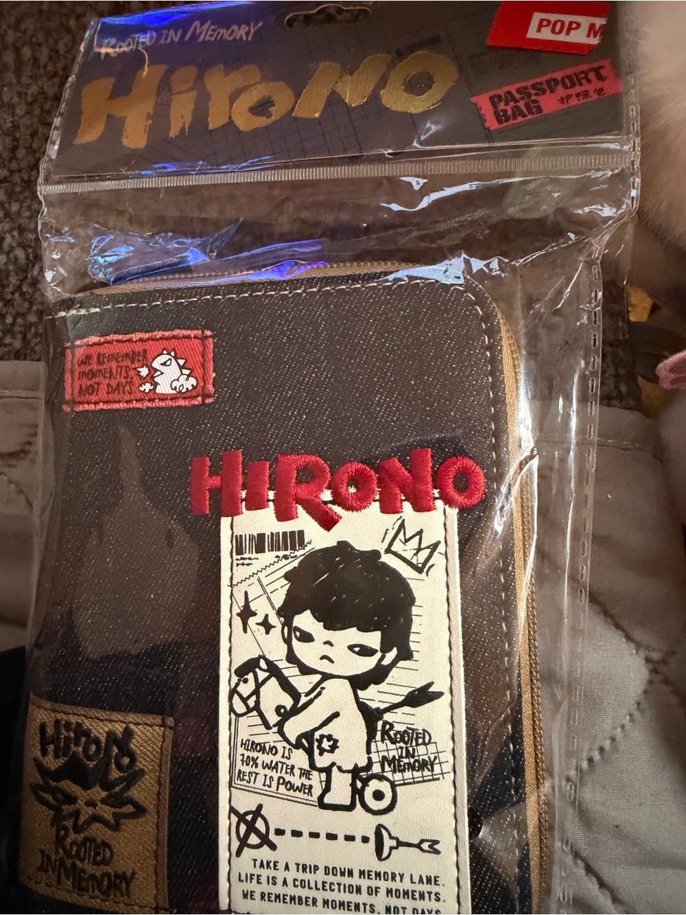the Hirono Echo Series - Passport (or wallet) Bag by Pop Mart
